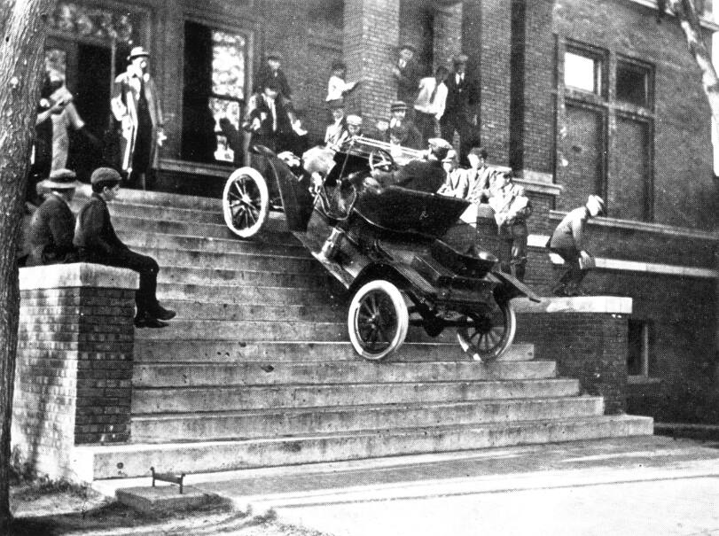 1911 Model T runabout driving up steps of YMCA 1911 Model T runabout driving up steps of YMCA